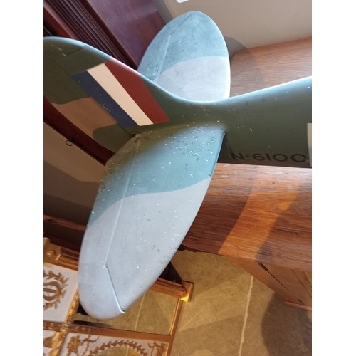 566 - A  kit built large scale model of a World War II Supermarine Spitfire LZ T N6100, painted paper on a... 