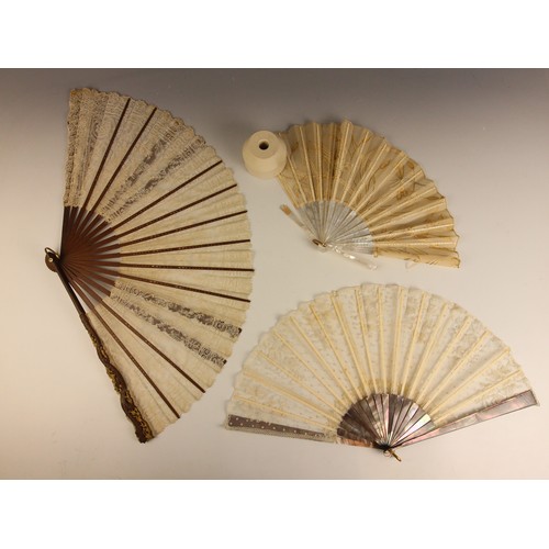 592 - An early 20th century French mother of pearl and sequin fan, embroidered with swallows and a dragon ... 