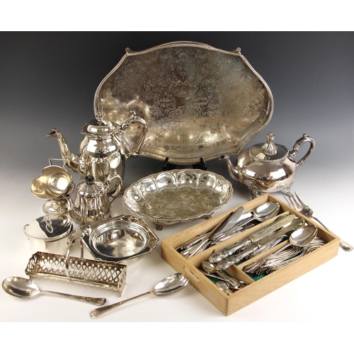 108 - A large selection of silver-plated pieces, including an Elkington and Co milk jug, 9cm high, a shape... 