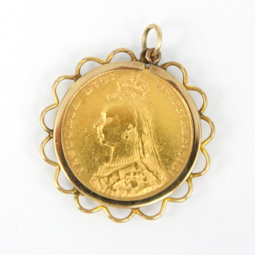 122 - A Victorian full sovereign, dated 1892, within yellow metal mount, 9.3gms