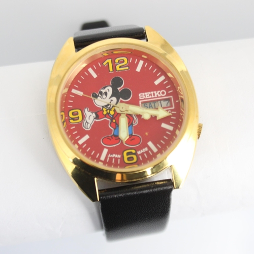 134 - A Seiko 'Mickey Mouse' wristwatch, Ref: 6309 5820, the circular dial with Arabic numerals and day/da... 