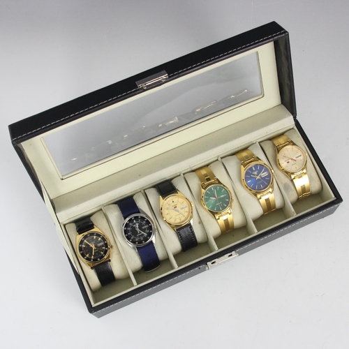 140 - A selection of five Seiko 5 automatic wristwatches, the circular dials all of various colours, with ... 