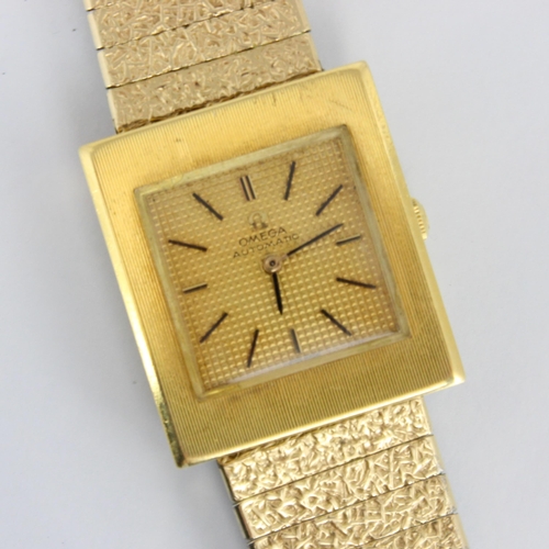 150 - An 18ct yellow gold cased Omega automatic wristwatch, the textured square gold coloured dial with ba... 