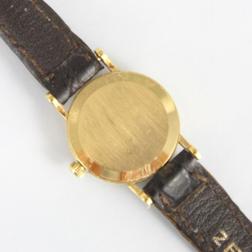 158 - A ladies Zenith wristwatch, the circular gold coloured dial with baton markers, set to plain polishe... 