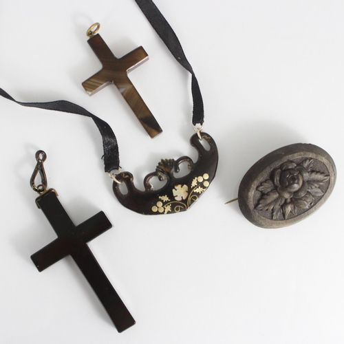 187 - A selection of jewellery, including a banded agate cross pendant, 6.5cm long, a 'jet' coloured cross... 