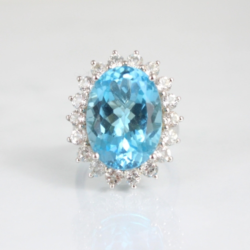 198 - A suite of untested blue topaz and white sapphire jewellery, including a cocktail ring and necklace,... 