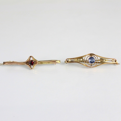 199 - An early 20th century seed pearl and blue stone set bar brooch, of openwork sinuous design, hinge pi... 