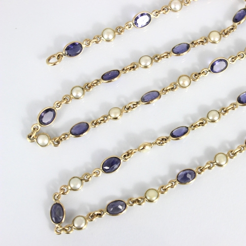 201 - An early 20th century style blister pearl and blue stone set chain, the twenty oval cut blue stones ... 