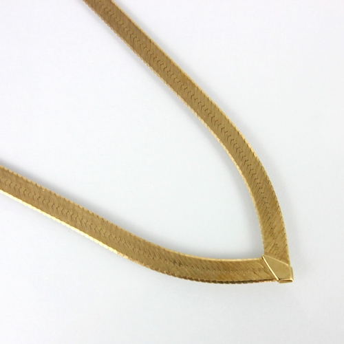 204 - A yellow metal Italian necklace, the arrow shaped herringbone link necklace with lobster fastener, s... 