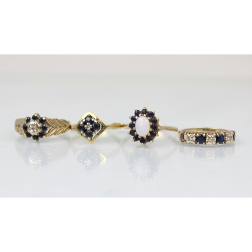 218 - A group of four dress rings, including an 18ct untested sapphire and diamond stylised cluster ring, ... 