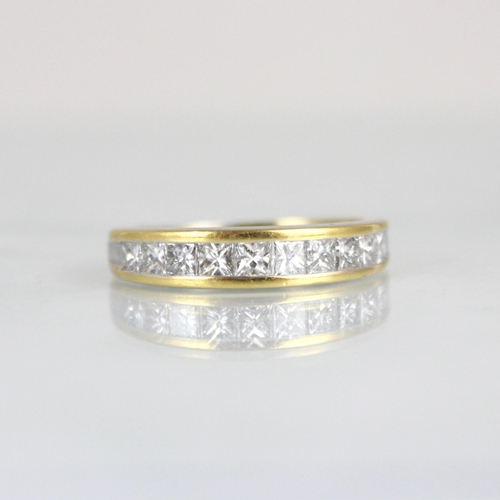 260 - A yellow metal diamond half eternity, the ten graduated princess cut diamonds channel set in yellow ... 