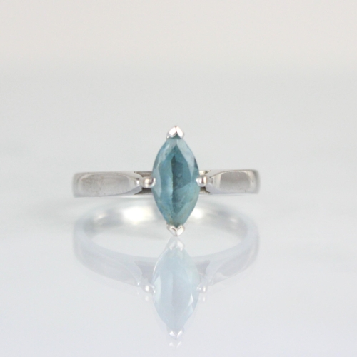 262 - A bespoke aquamarine solitaire ring, the marquise cut aquamarine within 18ct white metal claw settin... 