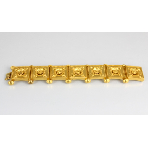 265 - A 19th century Etruscan Revival yellow metal bracelet, the seven square shaped panels with central s... 