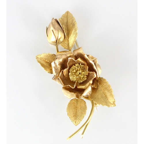 276 - An 18ct yellow gold floral spray brooch, the flowerhead and bud designed brooch of two tone design w... 