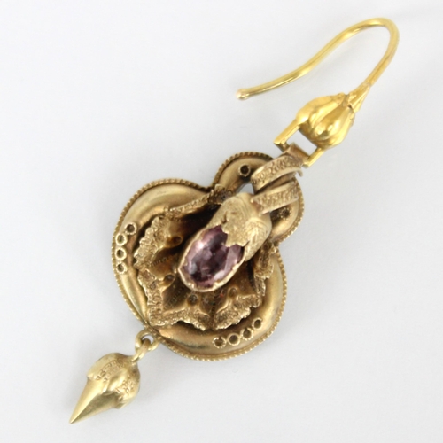 279 - A pair of 19th century gold coloured drop earrings, the shaped earring with foil backed pink stone d... 