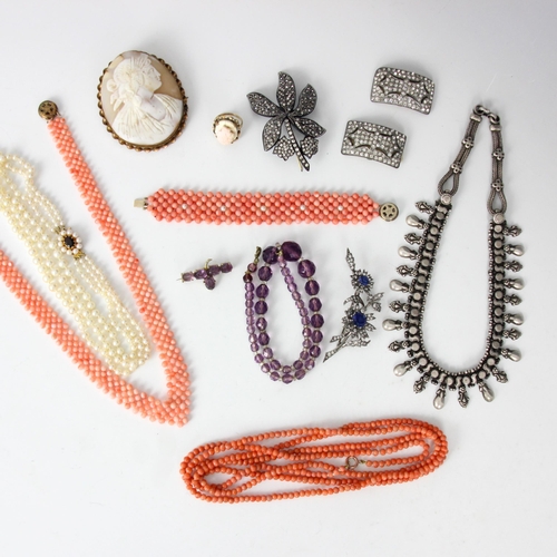 292 - A large selection of costume jewellery, including a yellow metal cameo ring, string of coral beads, ... 