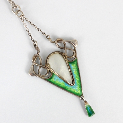 313 - An Art Nouveau enamel pendant, the central blister pearl in rubover mount, encompassed by green and ... 