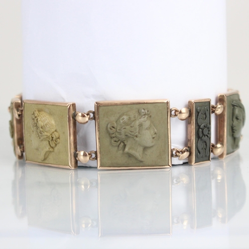 314 - A 19th century lava cameo bracelet, the six squared panels depicting goddesses, possibly depicting H... 