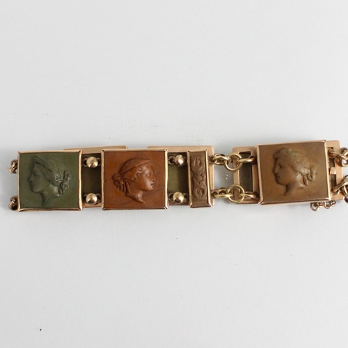 314 - A 19th century lava cameo bracelet, the six squared panels depicting goddesses, possibly depicting H... 