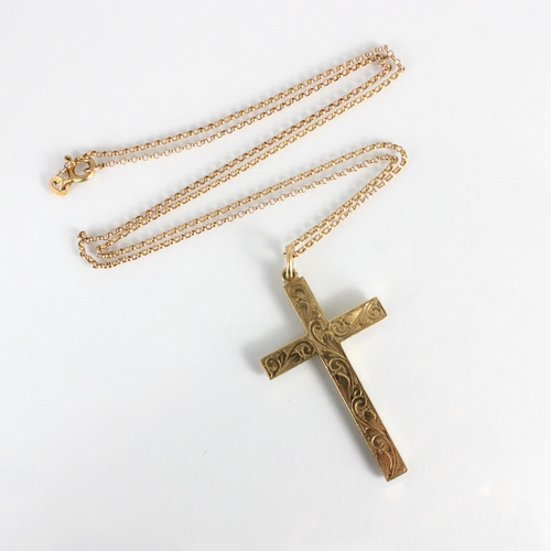 317 - A 9ct rose gold cross pendant, engraved with floral decoration to front, plain polished to reverse, ... 