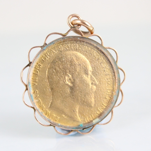 318 - An Edward VII dot engraved gilt half penny pendant, the reverse of the half penny depicting an Eton ... 