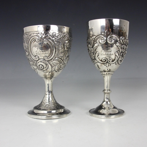 32 - An Edwardian silver goblet, possibly D and M Davis, Birmingham 1907, the fruit and foliate embossed ... 