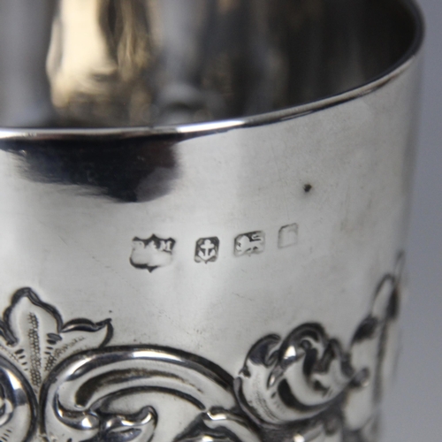 32 - An Edwardian silver goblet, possibly D and M Davis, Birmingham 1907, the fruit and foliate embossed ... 