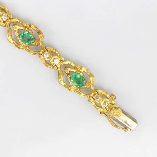 324 - An 18ct yellow gold emerald and diamond bracelet, in the Brutalist style, the seven oval organic sha... 