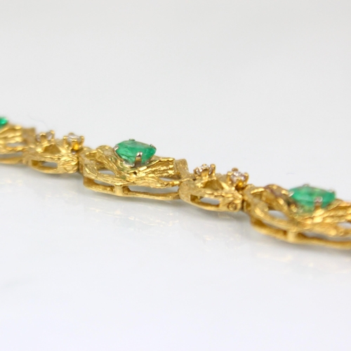 324 - An 18ct yellow gold emerald and diamond bracelet, in the Brutalist style, the seven oval organic sha... 