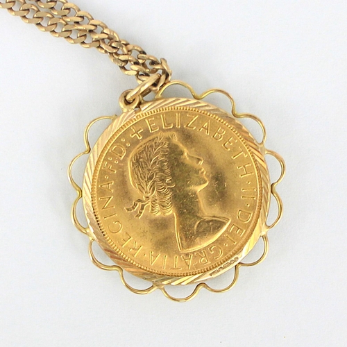 332 - An Elizabeth II full sovereign, dated 1963, within yellow metal pendant mount, upon a 9ct yellow gol... 