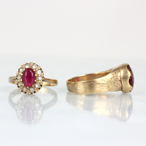 340 - A 9ct synthetic ruby ring, the round cut red stone within claw setting edge, leading to engraved sho... 