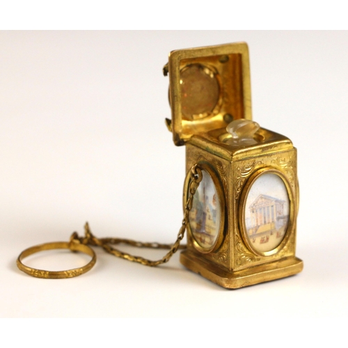 354 - A grand tour Palais Royal gilt metal mounted scent bottle on chatelaine, 19th century, modelled as a... 