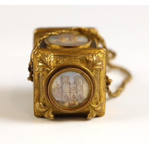 354 - A grand tour Palais Royal gilt metal mounted scent bottle on chatelaine, 19th century, modelled as a... 