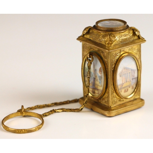 354 - A grand tour Palais Royal gilt metal mounted scent bottle on chatelaine, 19th century, modelled as a... 