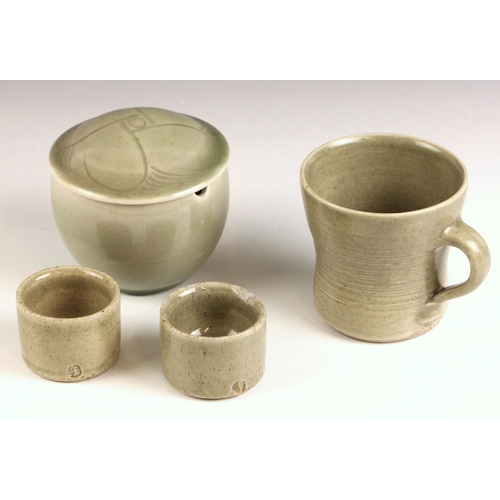 564 - A St. Ives Leach Pottery mug, mid 20th century, of flared and waisted form, impressed Leach Pottery ... 