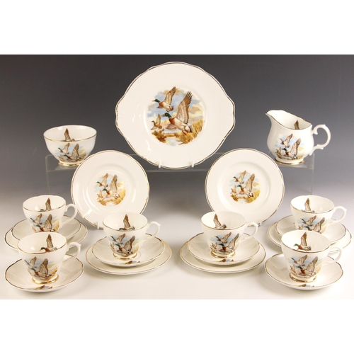 570 - HUNTING INTEREST: A Royal Worcester Group Palissy part dinner service in the 'Game Series' pattern, ... 