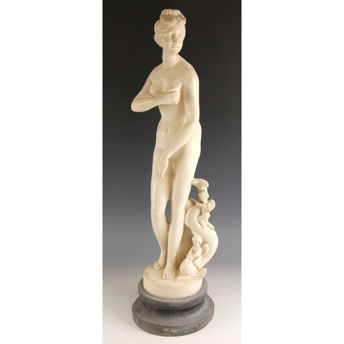 571 - A white marble effect model of the Medici Venus, 20th century, set to a slate socle base, 77cm high ... 