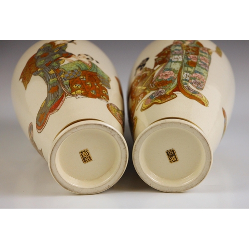 590 - A pair of Japanese Satsuma porcelain vases, Meiji Period (1868-1912), each vase of cylindrical ovoid... 