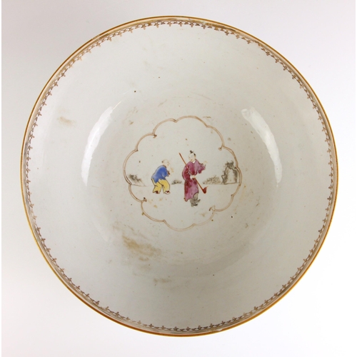 593 - A Chinese porcelain famille rose centre bowl, Qianlong (1736-1795), the large circular bowl external... 