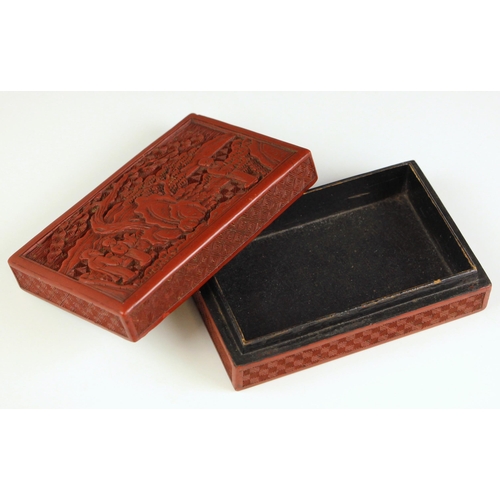 595 - A Chinese cinnabar lacquer box and cover, 19th/20th century, the rectangular box with removable cove... 