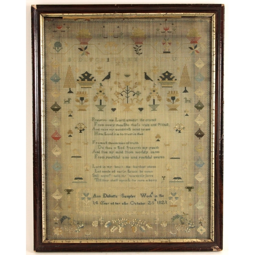 605 - An early George IV needlework sampler, worked by Ann Dicketts, aged fourteen years, the central vers... 