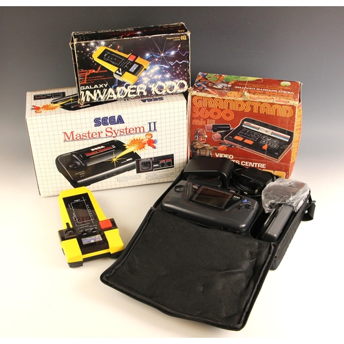 614 - A vintage CGL ‘Galaxy Invader 1000’ handheld computer space battle game, circa 1980, in original box... 