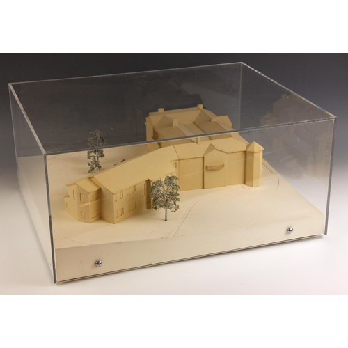 625 - An Architectural model of a residential building development, the baseboard 43.5cm x 55cm, the acryl... 