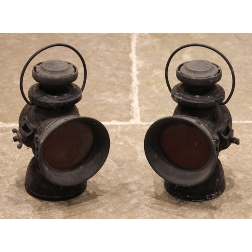 635 - A pair of vintage Lucas Ltd 'King of the road' oil powered motoring lamps, finished in black, 34cm h... 