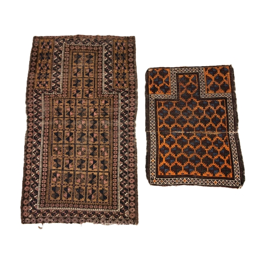 687 - An Afghan Belouch rug, in brown and blue colourways, the central field with an all-over gul design, ... 