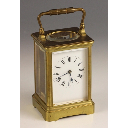 698 - A brass cased French carriage timepiece, early 20th century, the 5cm white enamelled dial applied wi... 