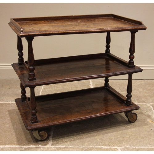 722 - A 19th century and later constructed pollard oak three tier drinks trolley, probably converted from ... 