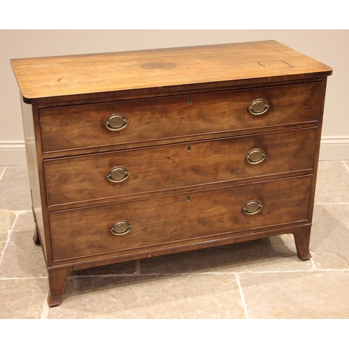 730 - An early 19th century mahogany chest of drawers, the rectangular top with rounded front corners over... 