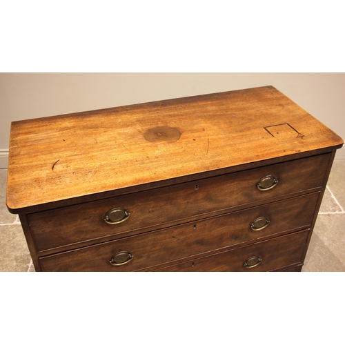 730 - An early 19th century mahogany chest of drawers, the rectangular top with rounded front corners over... 