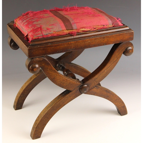 755 - A Regency mahogany 'X' frame stool, of cottage proportions, the upholstered drop-in seat upon curved... 